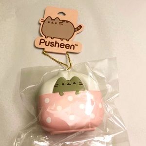 NWT Pusheen squishy keychain. Pink white dot bed